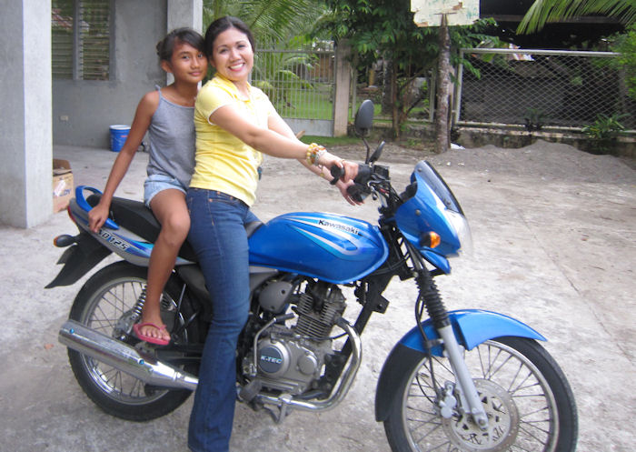 Women on Motorcycles Picture of a 2004 Kawasaki 125cc