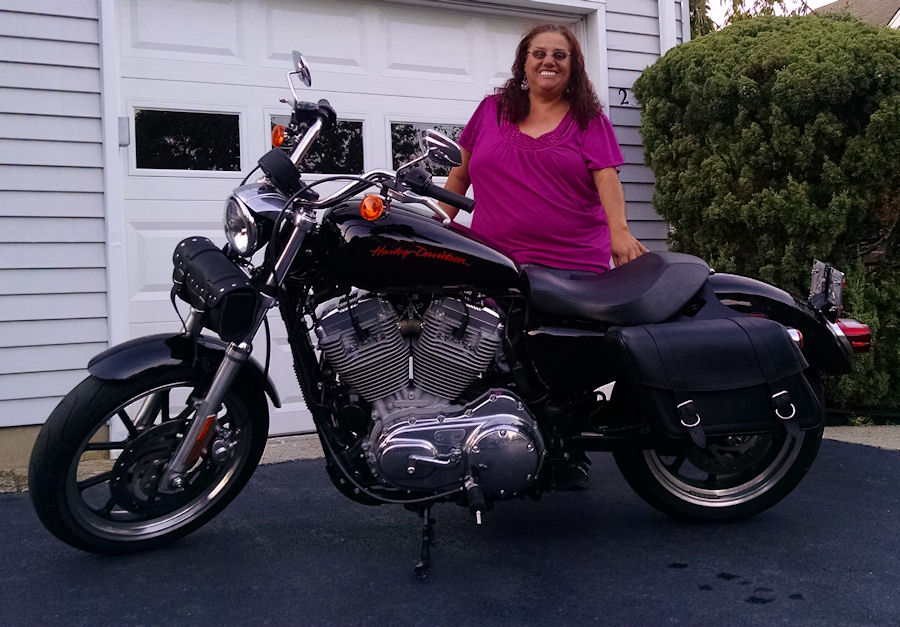 Women on Motorcycles Picture of a 2013 Harley-Davidson Sportster 883
