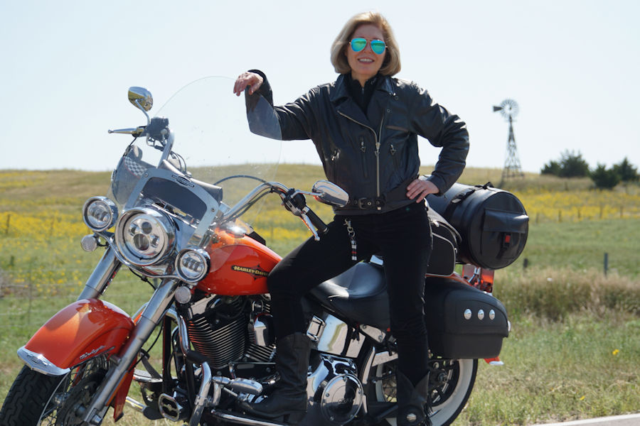 Women on Motorcycles Picture of a 2012 Harley-Davidson Softail Deluxe (FLSTN)